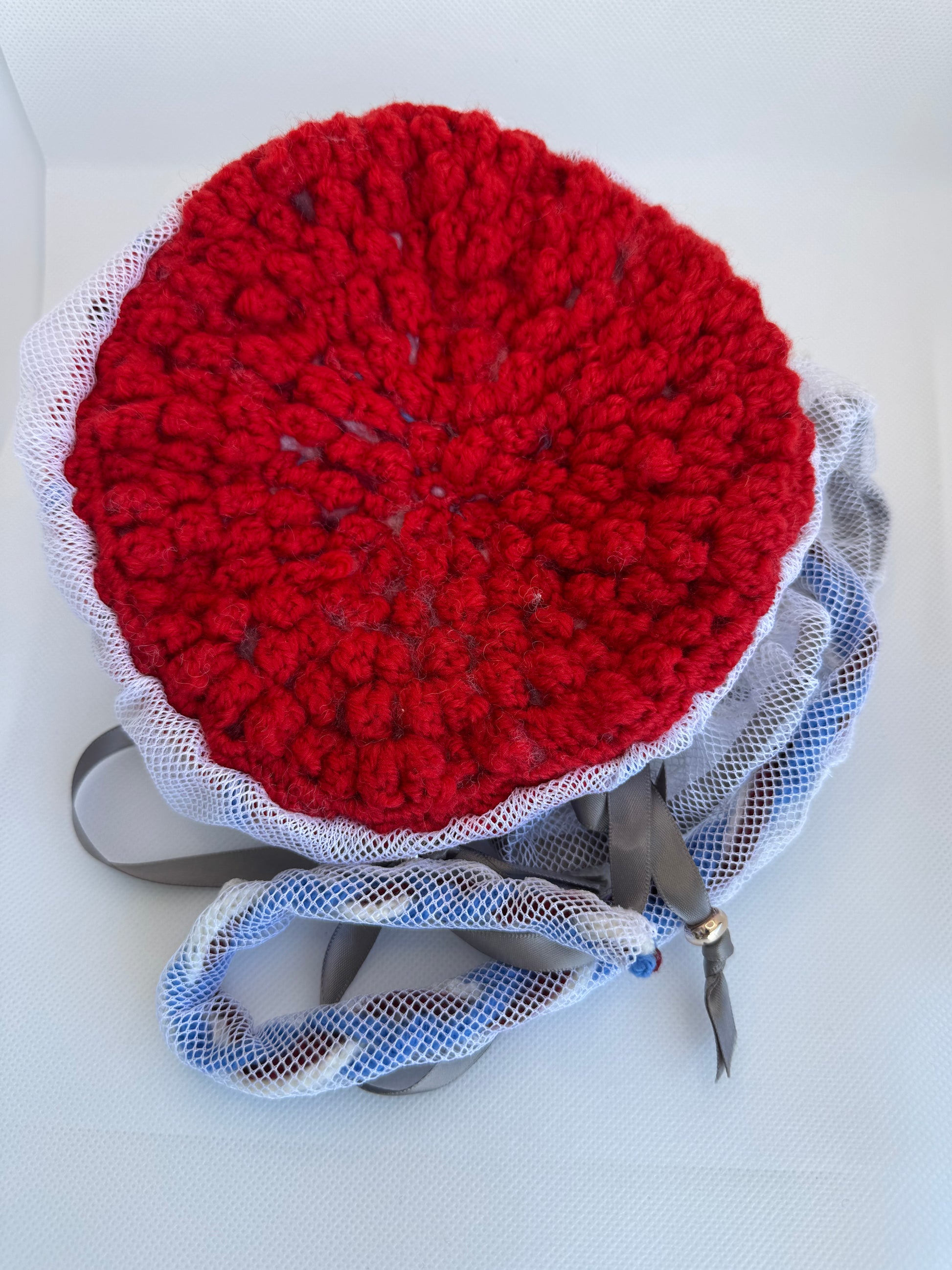 Red crocheted Childbirth Education Model