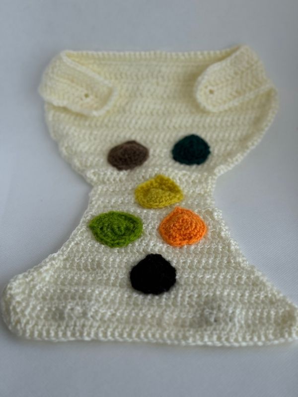 White crocheted healthy stool colour nappy opened